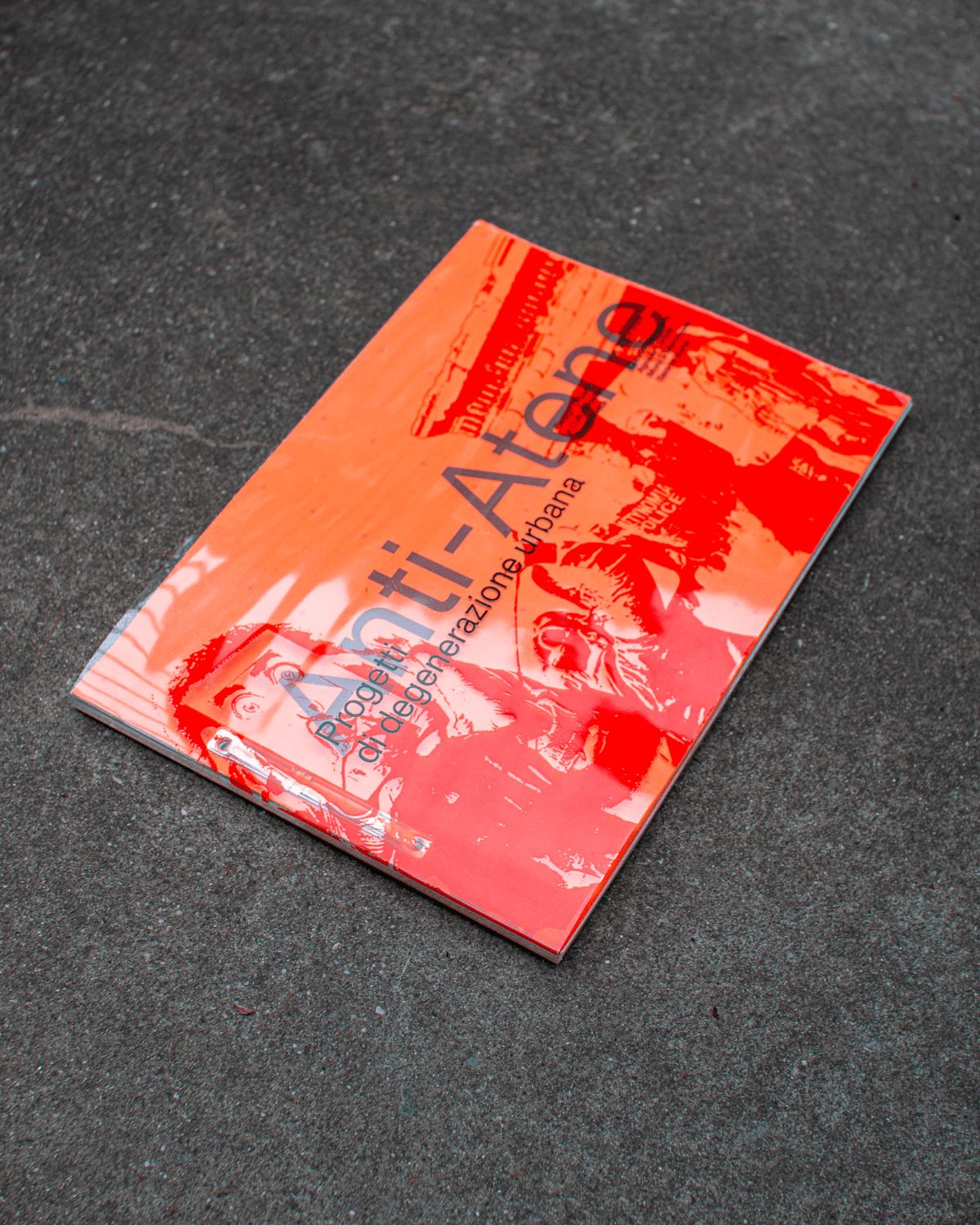 Anti-Atene book lying on dark stone