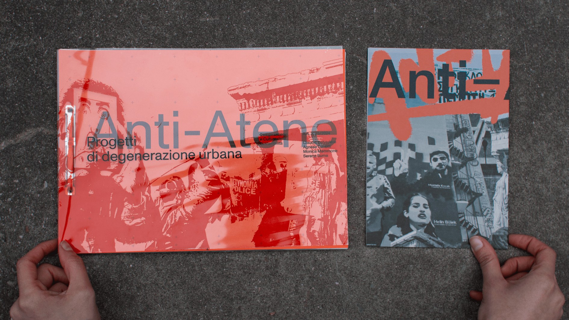 Anti-Atene publication is laid on concrete: the large orange horizontal book showing the cover with subtitle Progetti di degenerazione urbana, beside the folded poster