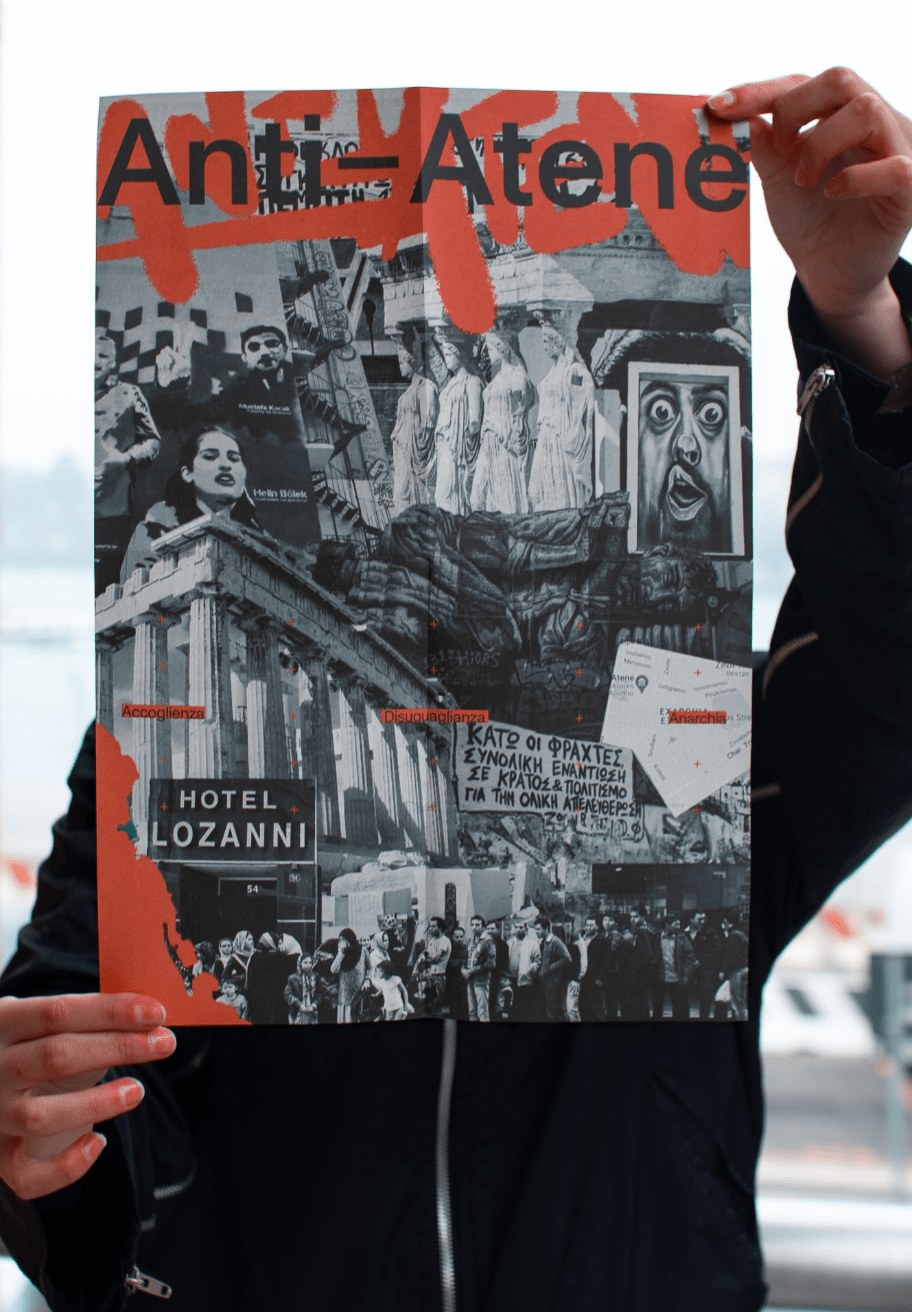 Hand holding the Anti-Atene poster showing a collage of black-and-white photographs of Athens — the Acropolis, protest scenes, street art — overlaid with red brushstroke typography and labels reading Accoglienza, Disuguaglianza, Anarchia